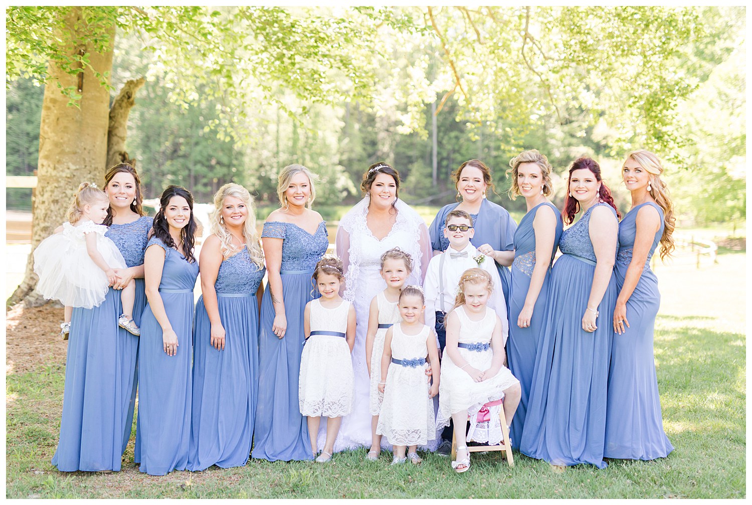 Bride with dusty blue bridesmaids dresses at the Gathering Place in Gastonia NC by Charlotte Wedding Photographer, Jacqueline Jones Photography