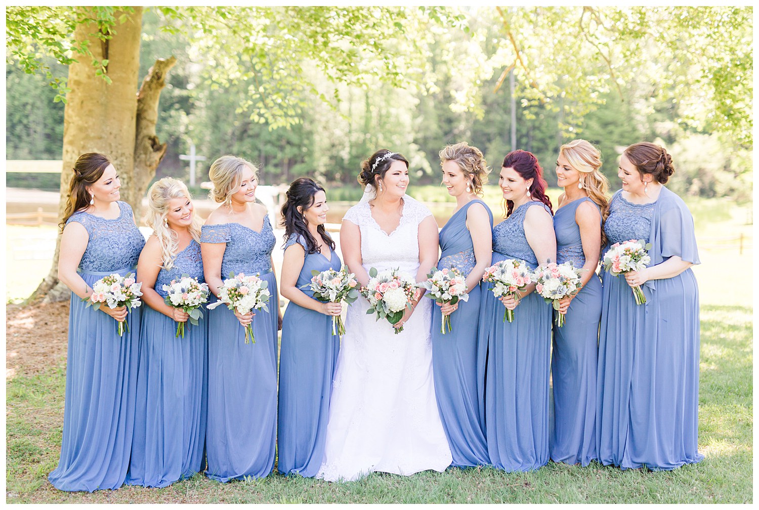 Bride with dusty blue bridesmaids dresses at the Gathering Place in Gastonia NC by Charlotte Wedding Photographer, Jacqueline Jones Photography