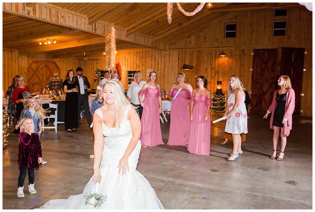 Bouquet throw at the Shed at Quiet Hollow in Maiden, NC by Charlotte wedding photographer, Jacqueline Jones