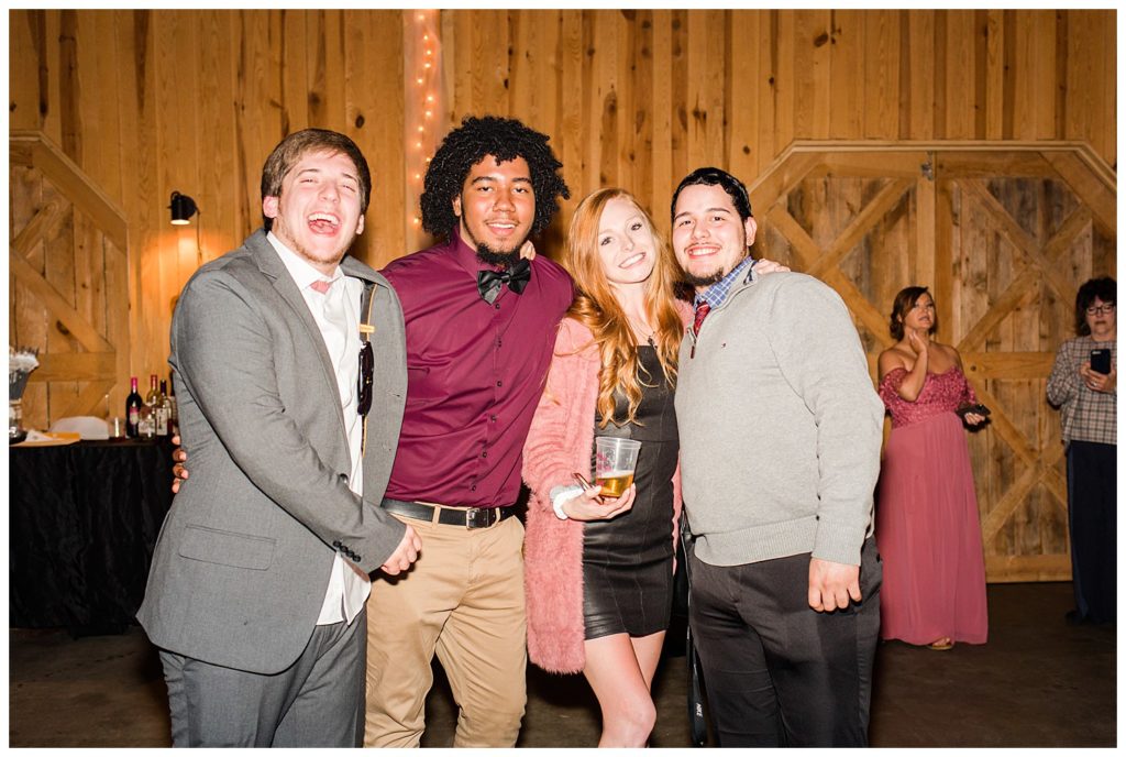 Wedding guests at the Shed at Quiet Hollow in Maiden, NC by Charlotte wedding photographer, Jacqueline Jones