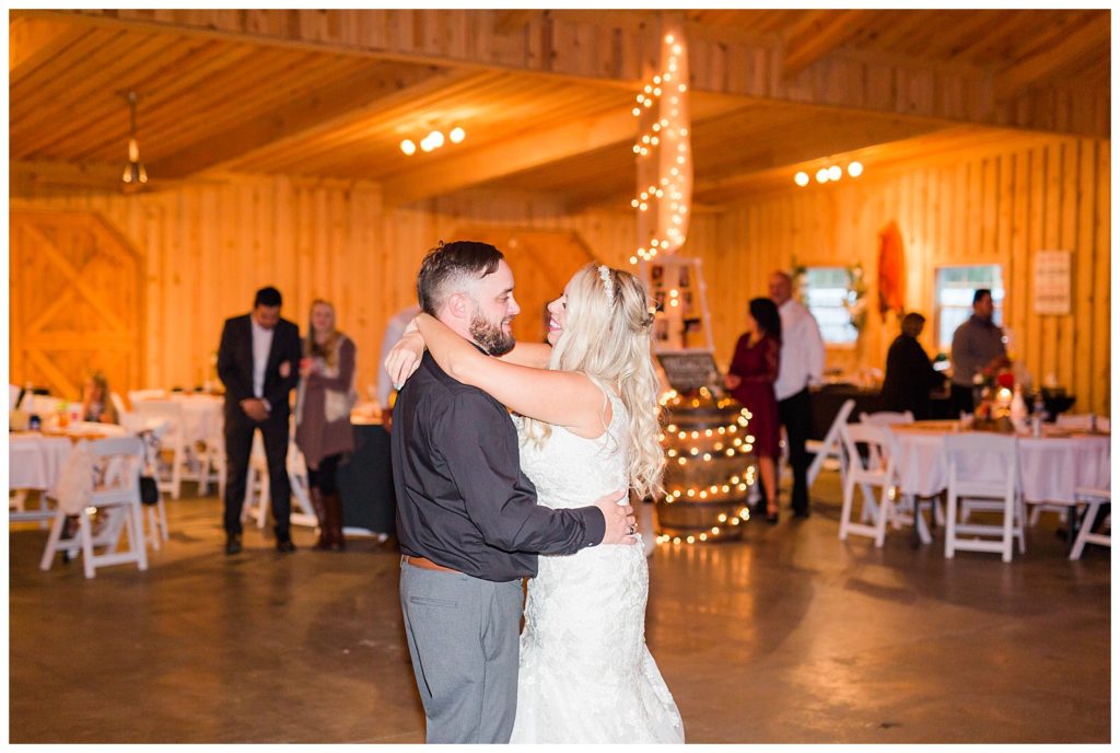 Bride and groom dancing at the Shed at Quiet Hollow in Maiden, NC by Charlotte wedding photographer, Jacqueline Jones