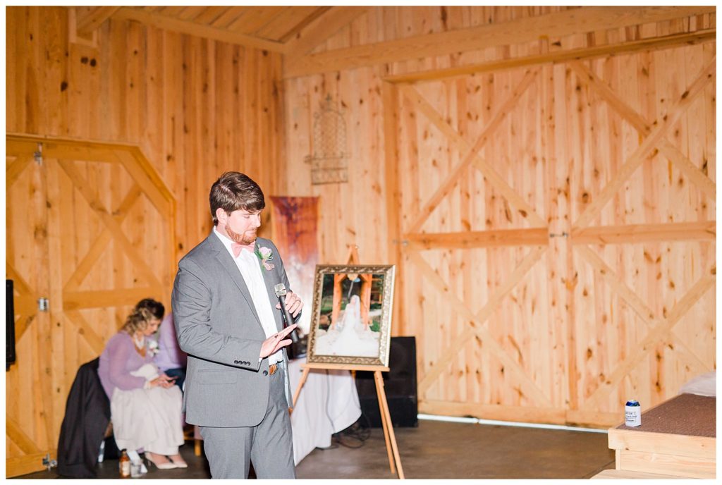 Toast at wedding at the Shed at Quiet Hollow in Maiden, NC by Charlotte wedding photographer, Jacqueline Jones