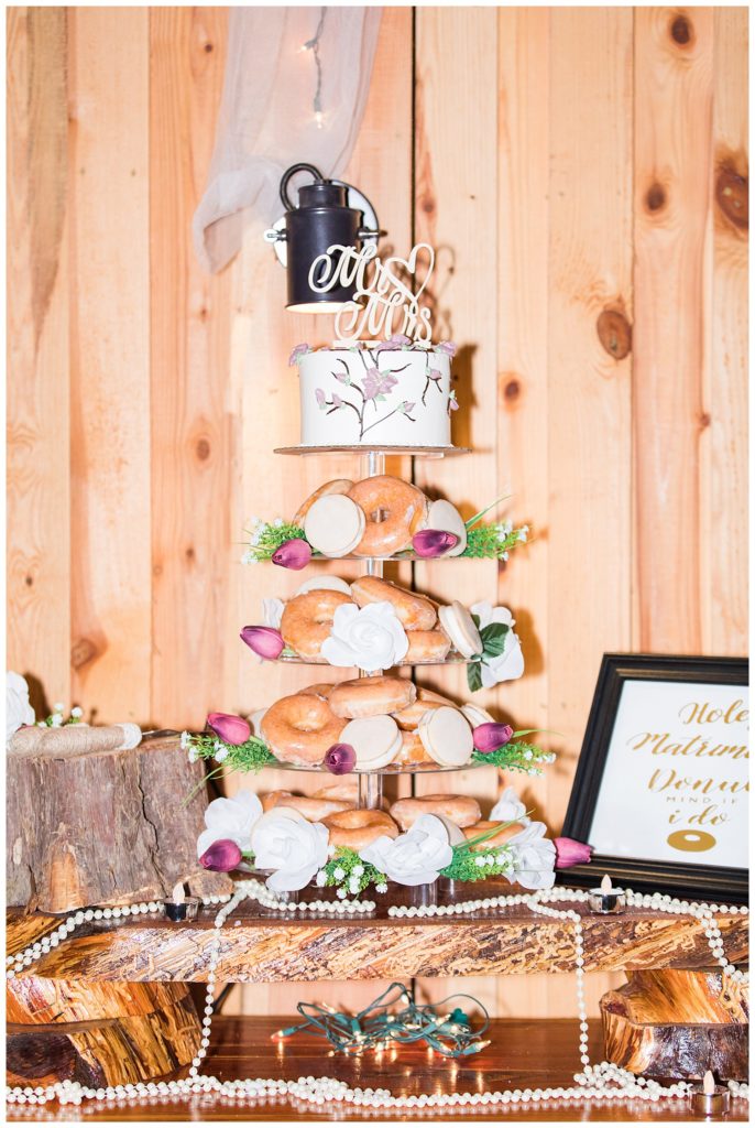 Donut wedding cake at the Shed at Quiet Hollow in Maiden, NC by Charlotte wedding photographer, Jacqueline Jones