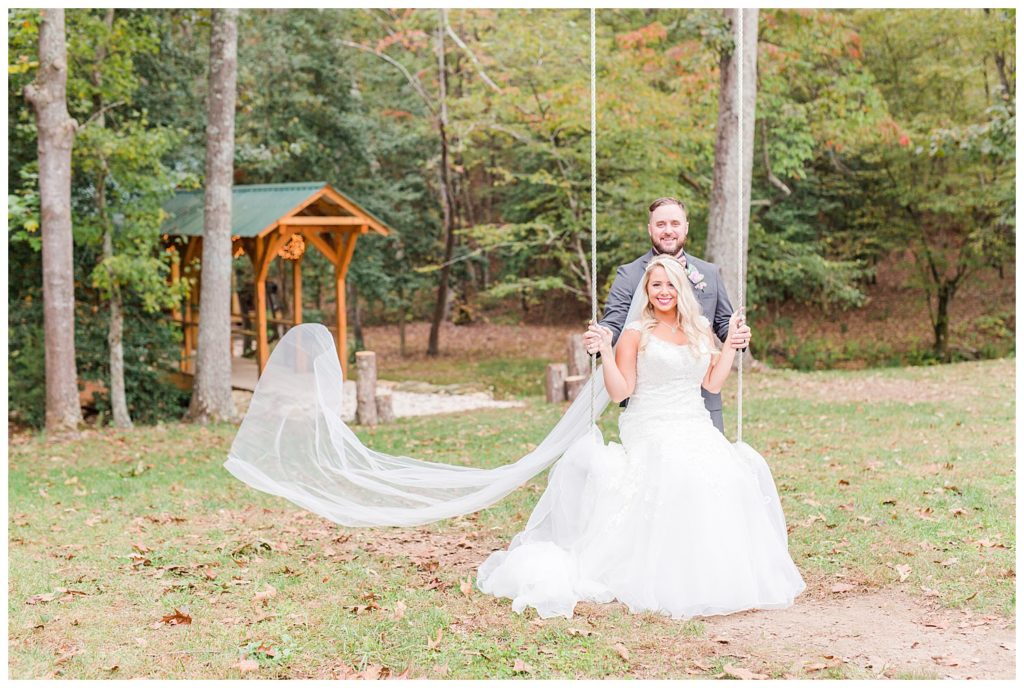 Bride on swing at the Shed at Quiet Hollow in Maiden, NC by Charlotte wedding photographer, Jacqueline Jones