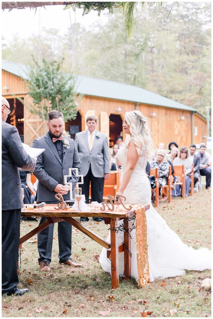 Bride and groom at the Shed at Quiet Hollow in Maiden, NC by Charlotte wedding photographer, Jacqueline Jones