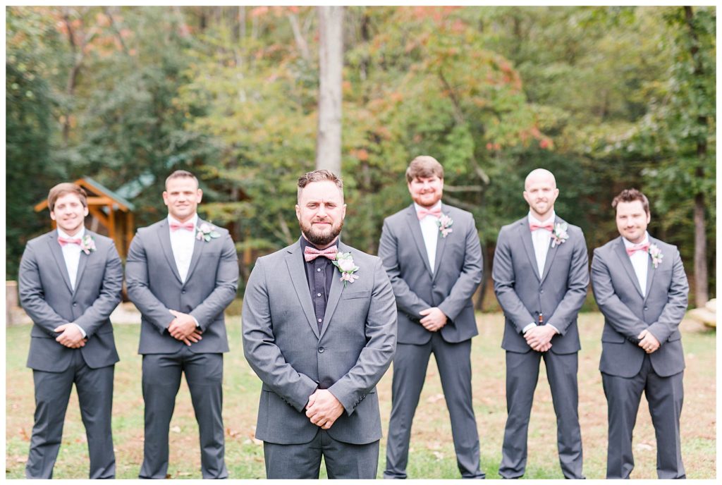 Groom and groomsmen at wedding at the Shed at Quiet Hollow in Maiden, NC by Charlotte wedding photographer, Jacqueline Jones