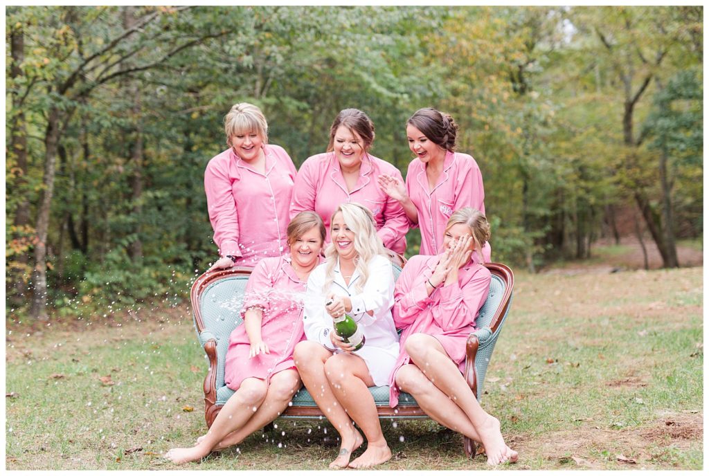 Bride and bridesmaids at at the Shed at Quiet Hollow in Maiden, NC by Charlotte wedding photographer, Jacqueline Jones