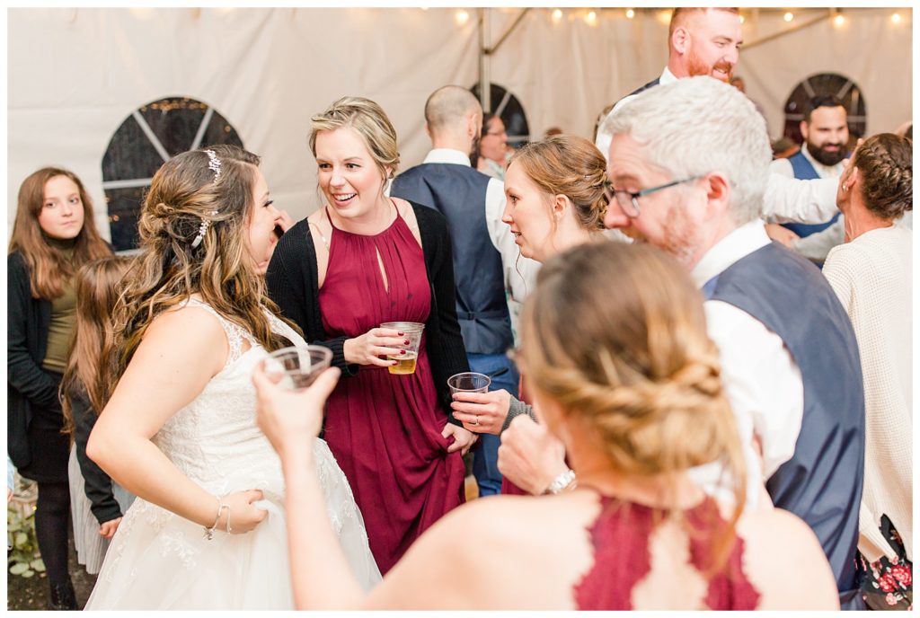 Wedding guests in Morganton, NC at Double C’s Acres by Charlotte wedding photographer, Jacqueline Jones