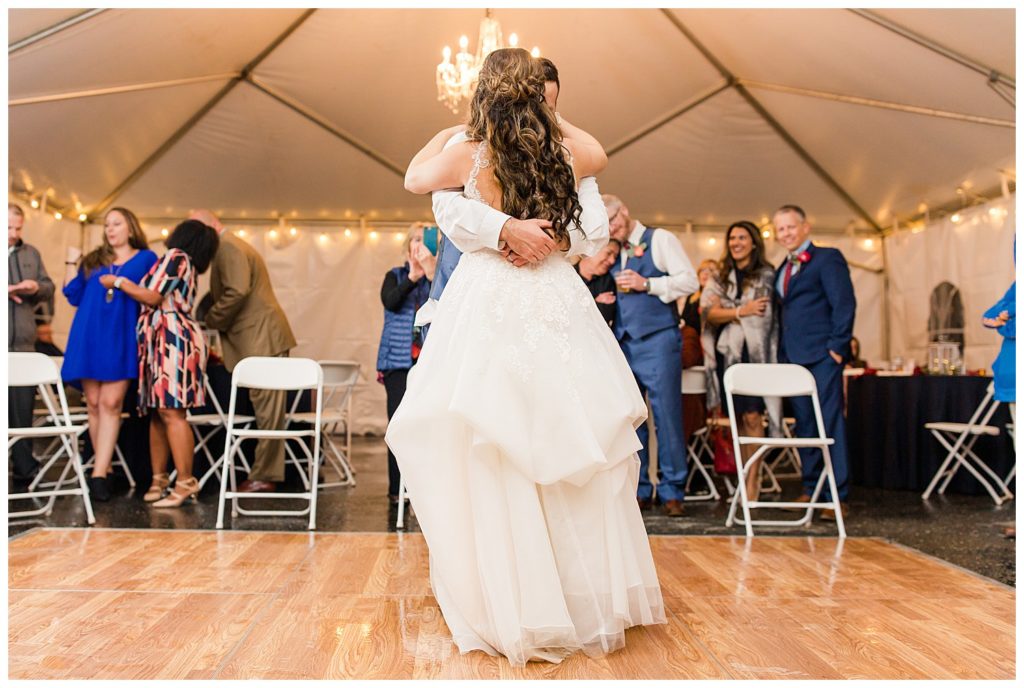 Bride and groom dancing in Morganton, NC at Double C’s Acres by Charlotte wedding photographer, Jacqueline Jones