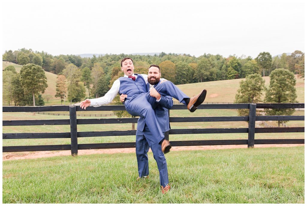 Groom and groomsman in Morganton, NC at Double C’s Acres by Charlotte wedding photographer, Jacqueline Jones