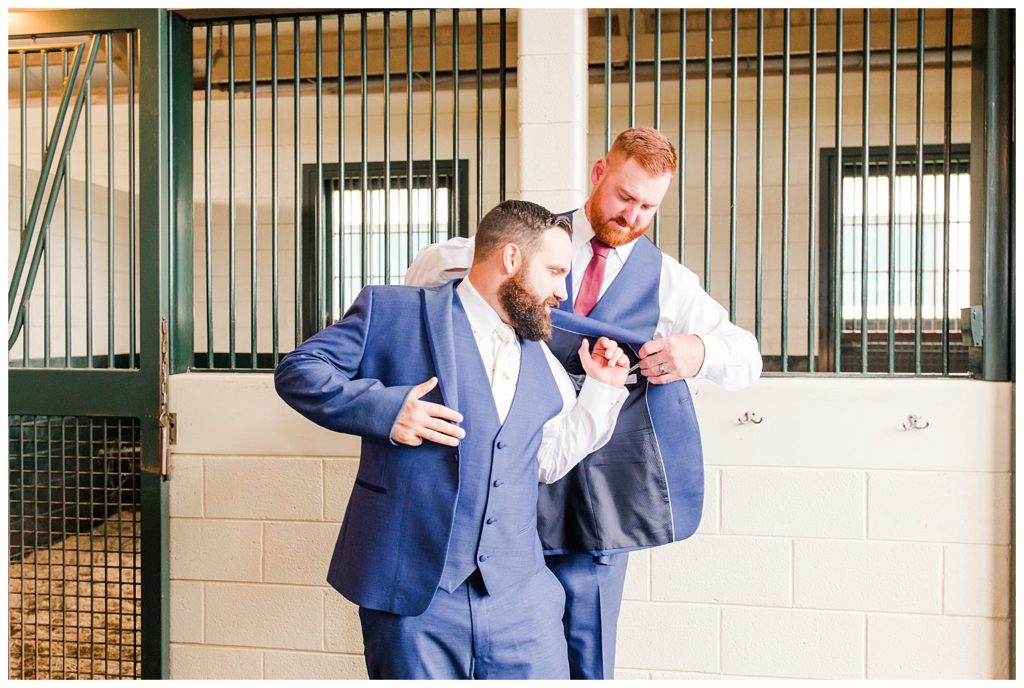 Groom preparing in Morganton, NC at Double C’s Acres by Charlotte wedding photographer, Jacqueline Jones