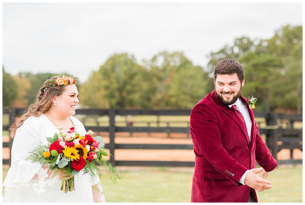 Groom and bride at wedding at Circle M Farm in Lincolnton, NC by Charlotte wedding photographer, Jaqueline Jones