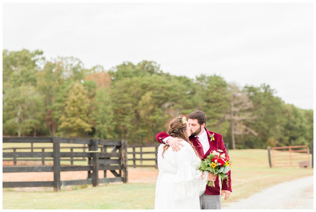 Groom and bride at wedding at Circle M Farm in Lincolnton, NC by Charlotte wedding photographer, Jaqueline Jones