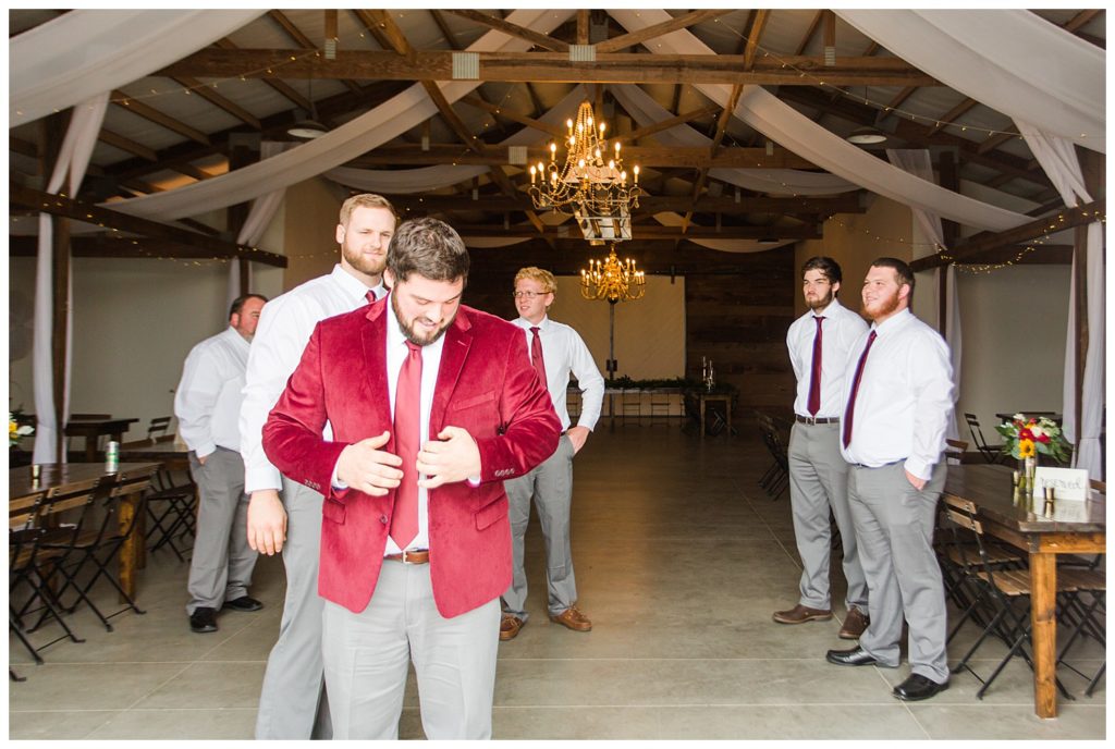 Groom preparing at Circle M Farm in Lincolnton, NC by Charlotte wedding photographer, Jaqueline Jones