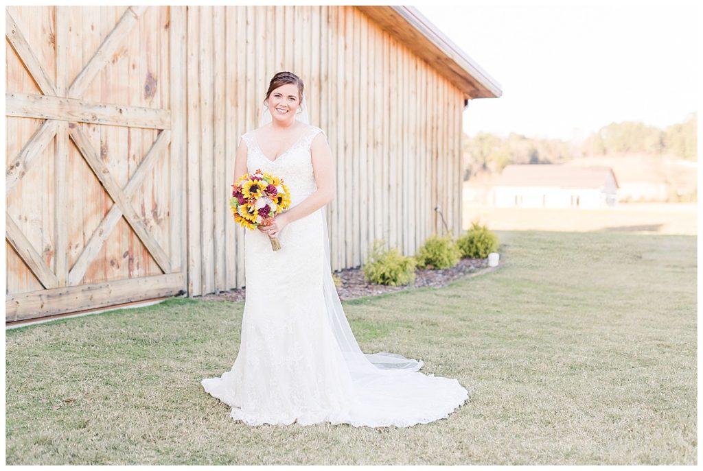 Bride and wedding dress at the Barn at Sandcastle in Charlotte, NC by Charlotte wedding photographer, Jacqueline Jones