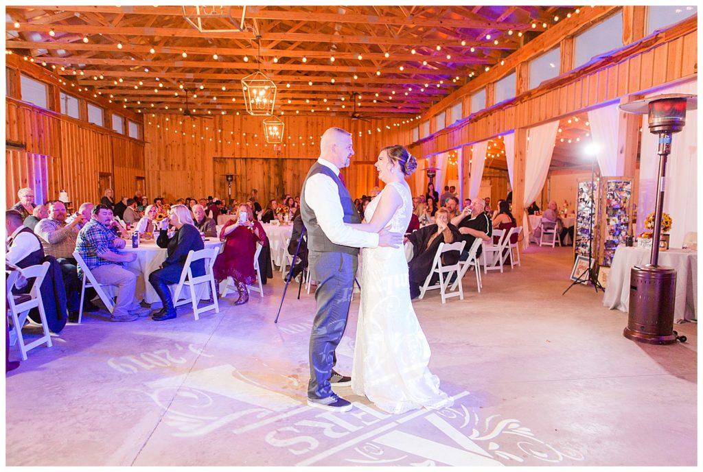 Father and bride dancing at the Barn at Sandcastle in Charlotte, NC by Charlotte wedding photographer, Jacqueline Jones