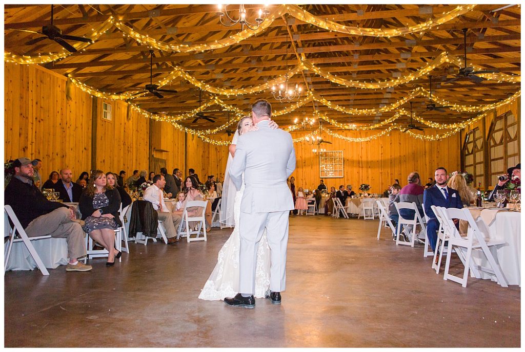 Bride and groom dancing at NC wedding in Mount Pleasant at the Farm at Brusharbor by Charlotte wedding photographer, Jacqueline Jones