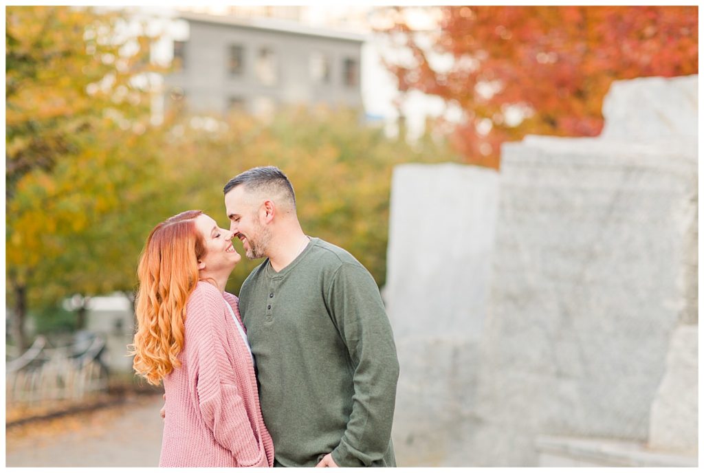 Engaged couple at the Romare Bearden Park in Charlotte, NC, by Charlotte engagement photographer, Jacqueline Jones