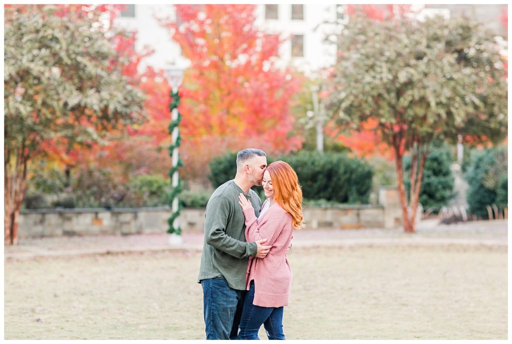 Engaged couple at the Romare Bearden Park in Charlotte, NC, by Charlotte engagement photographer, Jacqueline Jones