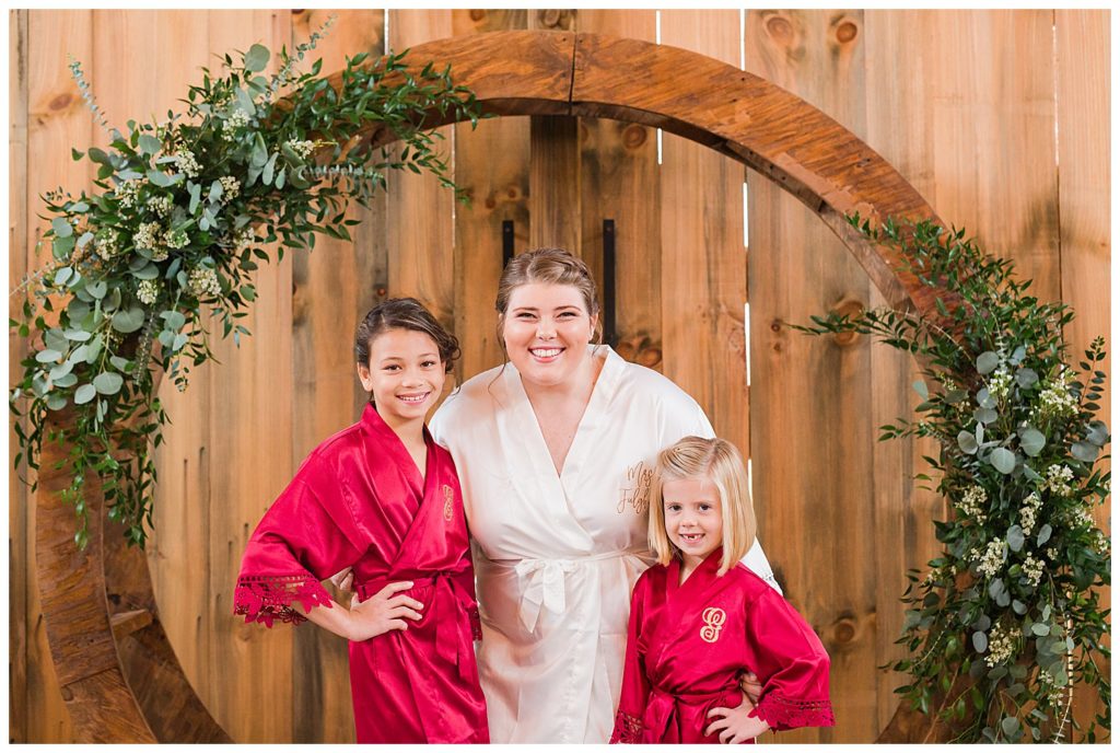 Flower girls and bride at the Barn at Sandcastle Farm in Dallas, NC by Charlotte wedding photographer, Jacqueline Jones