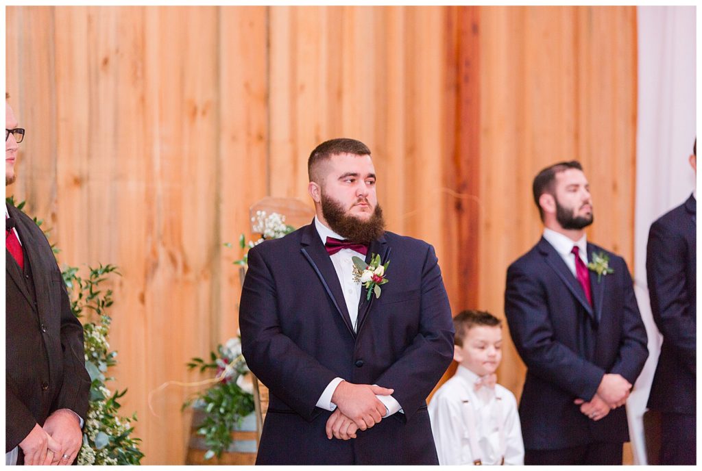 Groom at the alter at the Barn at Sandcastle Farm in Dallas, NC by Charlotte wedding photographer, Jacqueline Jones