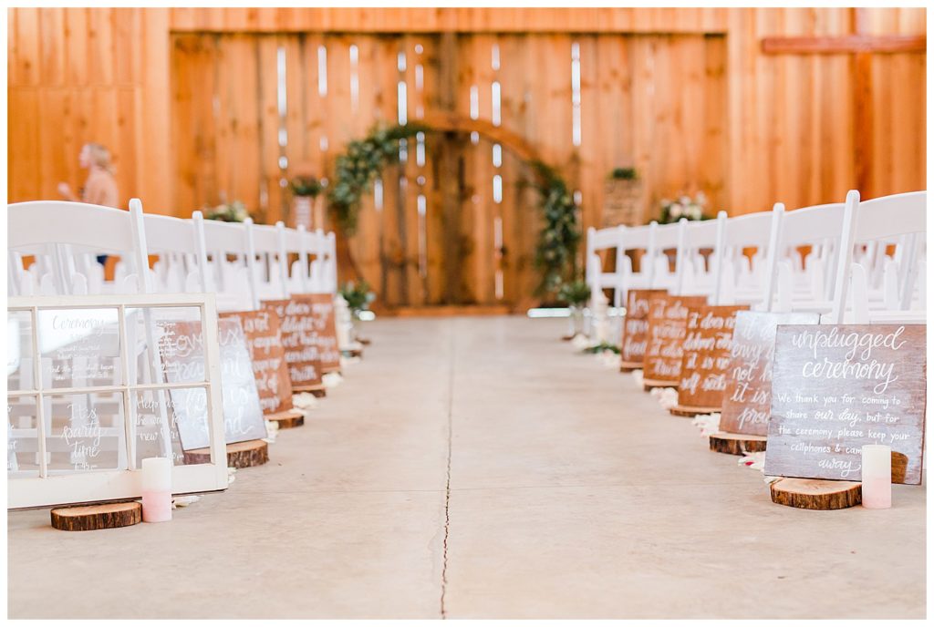 Seating and wedding aisle at the Barn at Sandcastle Farm in Dallas, NC by Charlotte wedding photographer, Jacqueline Jones