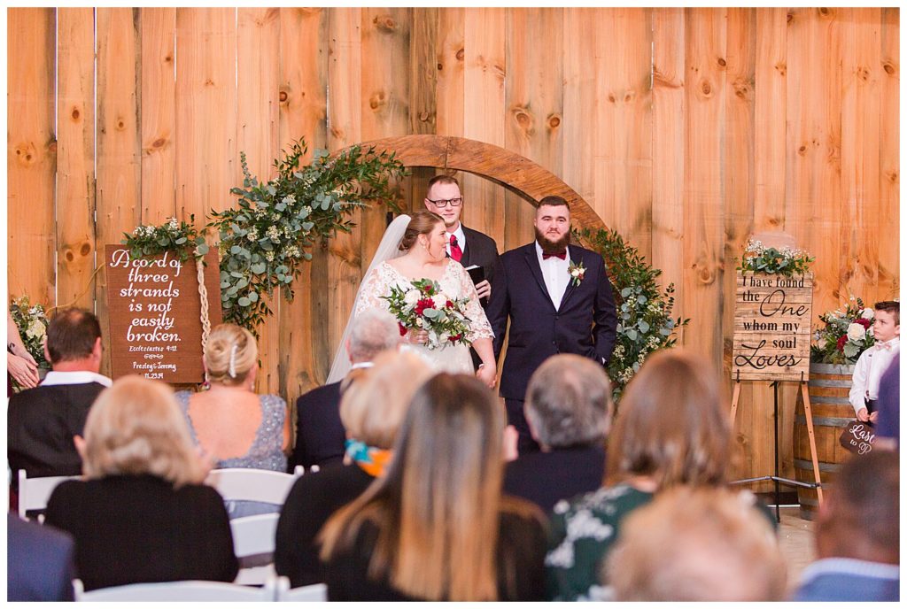 Wedding guests, bride and groom at the Barn at Sandcastle Farm in Dallas, NC by Charlotte wedding photographer, Jacqueline Jones