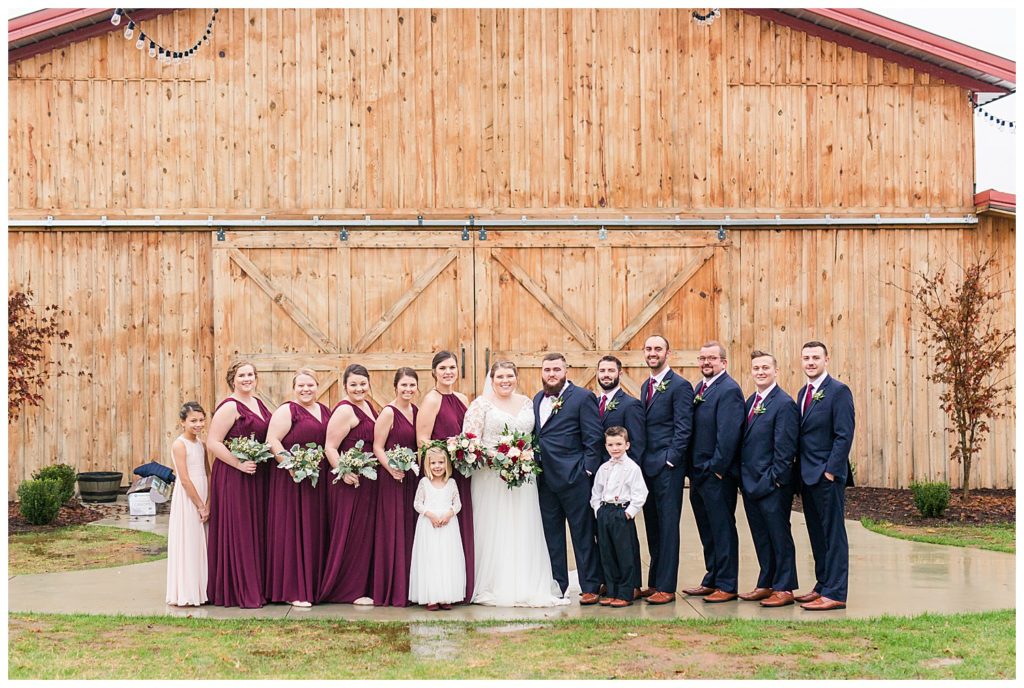 Bride, bridesmaids, groom, groomsmen at the Barn at Sandcastle Farm in Dallas, NC by Charlotte wedding photographer, Jacqueline Jones