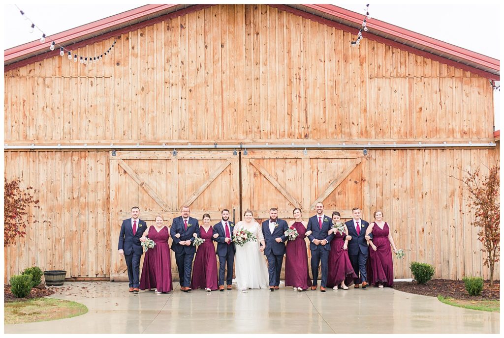 Bride, bridesmaids, groom, groomsmen at the Barn at Sandcastle Farm in Dallas, NC by Charlotte wedding photographer, Jacqueline Jones