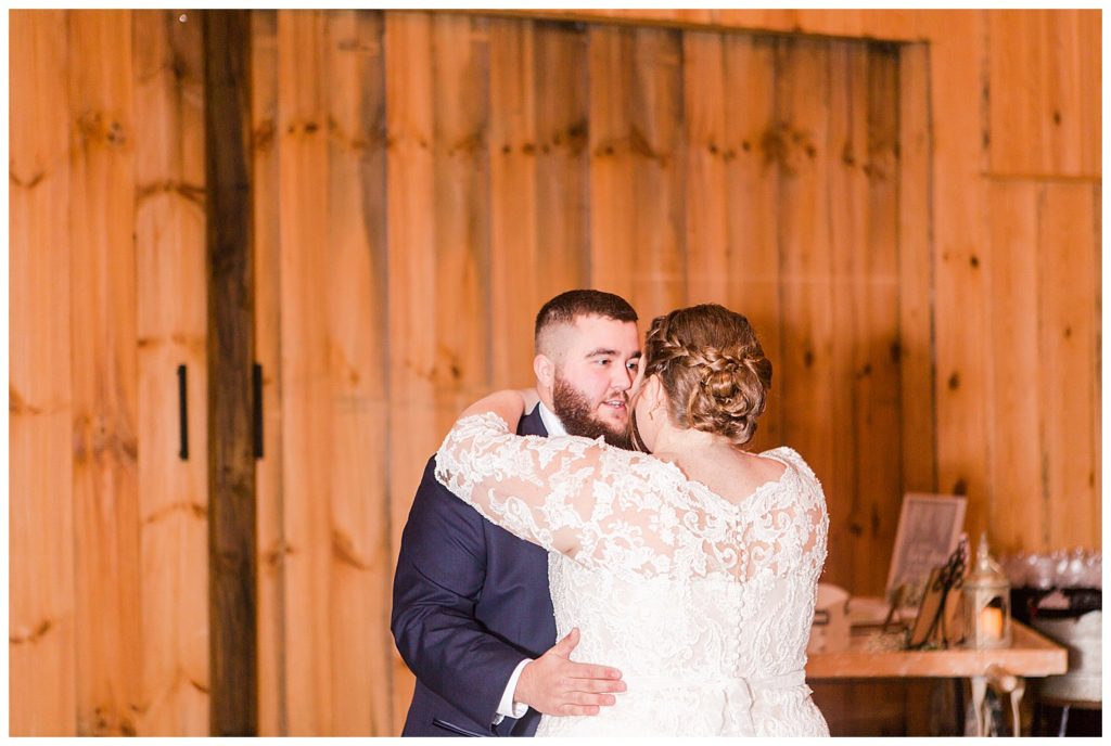 Groom and bride dancing at the Barn at Sandcastle Farm in Dallas, NC by Charlotte wedding photographer, Jacqueline Jones