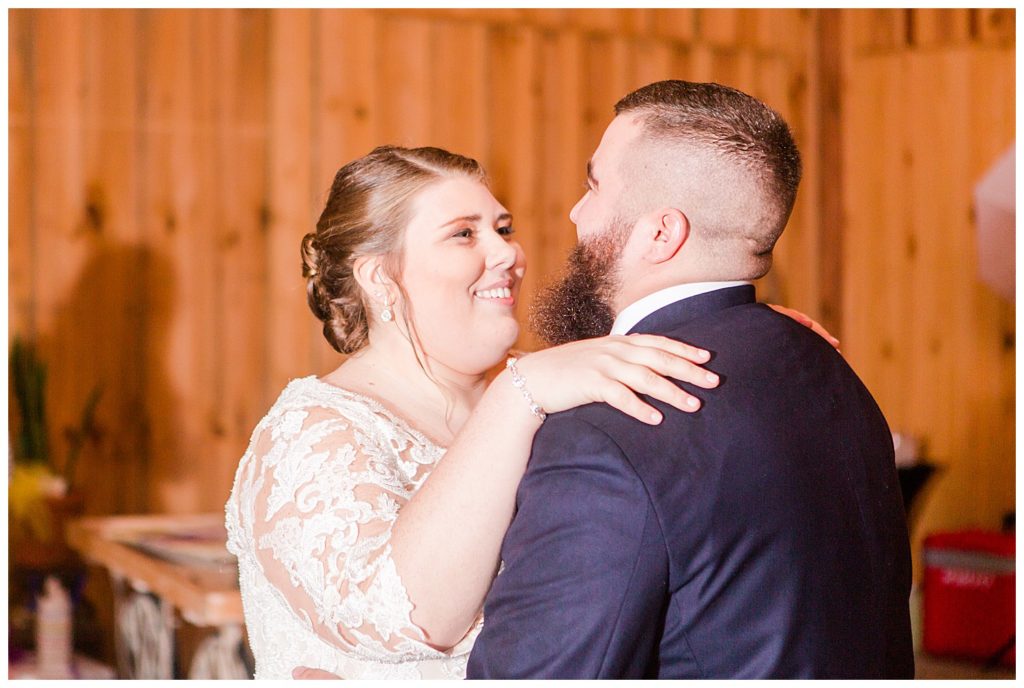 Groom and bride dancing at the Barn at Sandcastle Farm in Dallas, NC by Charlotte wedding photographer, Jacqueline Jones