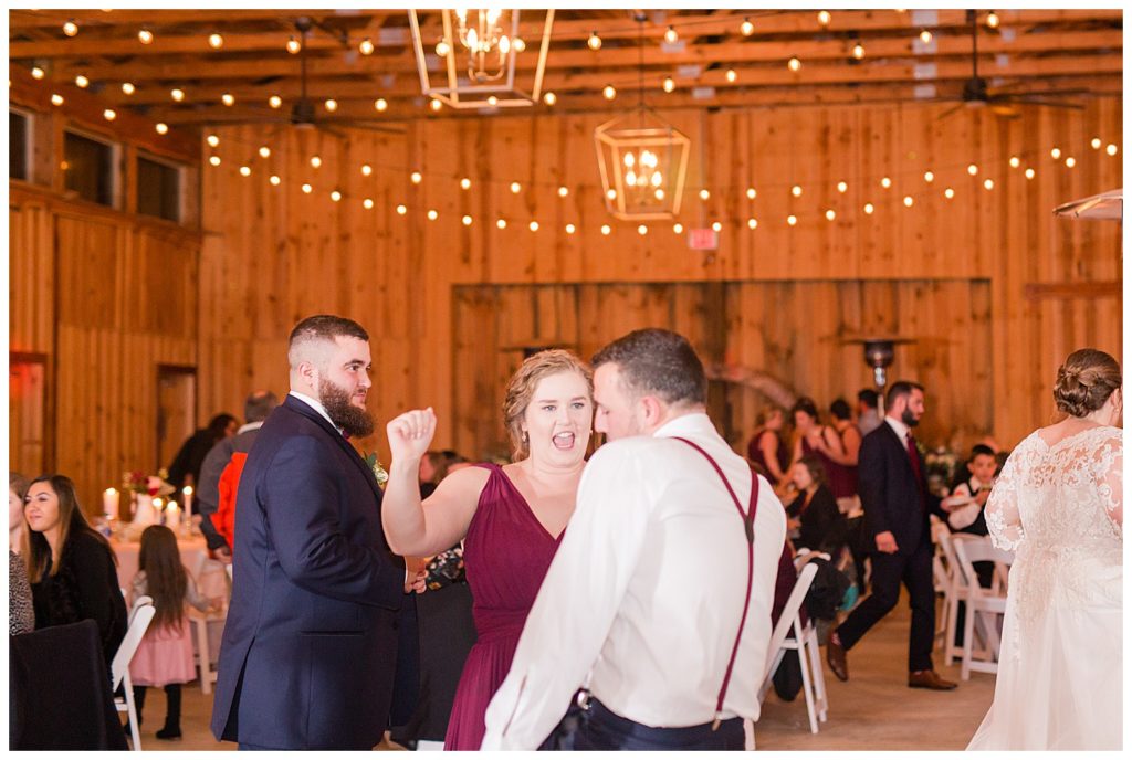 Groom and guests dancing on dance floor at the Barn at Sandcastle Farm in Dallas, NC by Charlotte wedding photographer, Jacqueline Jones