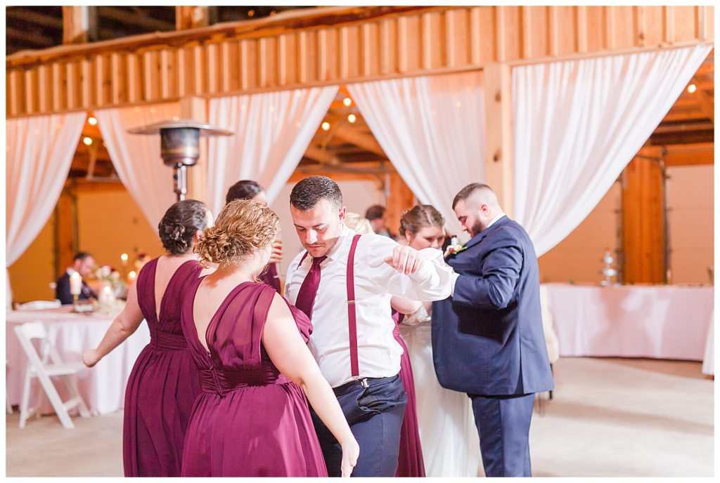 Dancing bridesmaids and groomsmen at the Barn at Sandcastle Farm in Dallas, NC by Charlotte wedding photographer, Jacqueline Jones